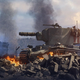 A tank climbs over rubble in a smoldering battlefield.